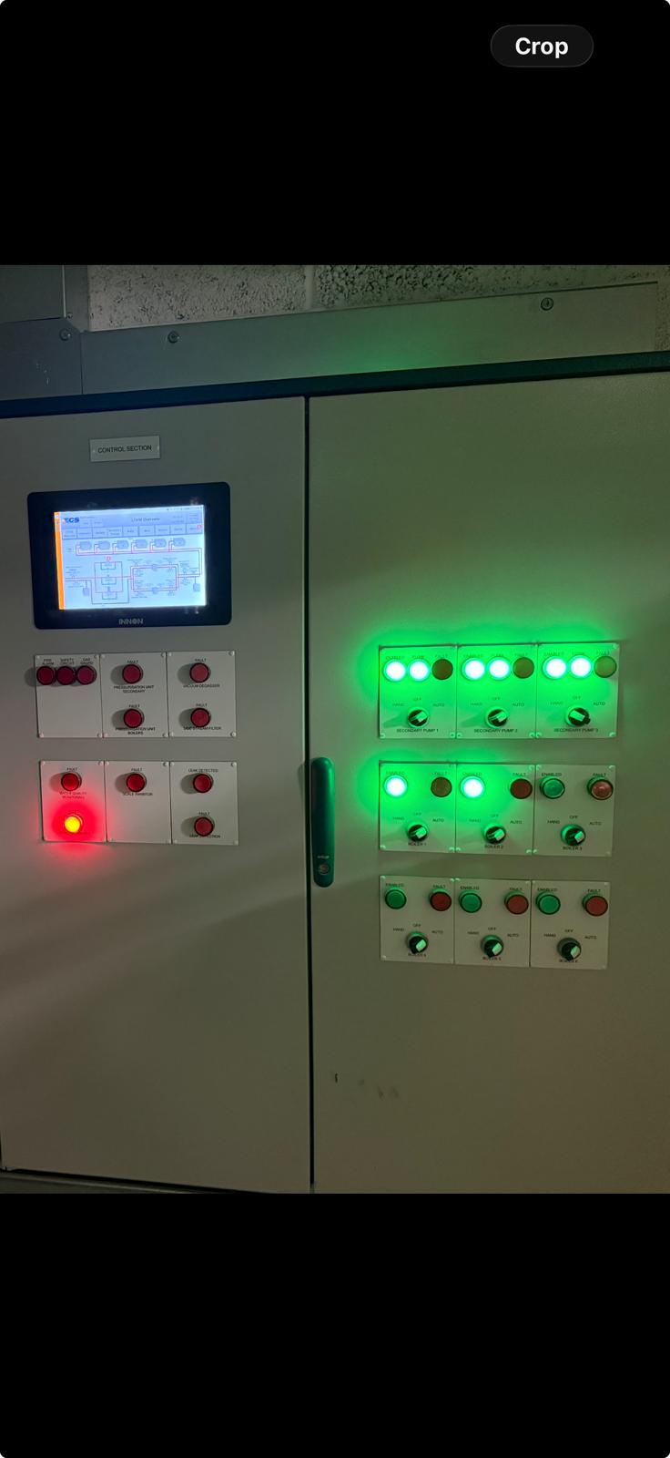BIAV-designed BMS control panel with INNON HMI, boiler and secondary pump status — built to BS EN 61439
